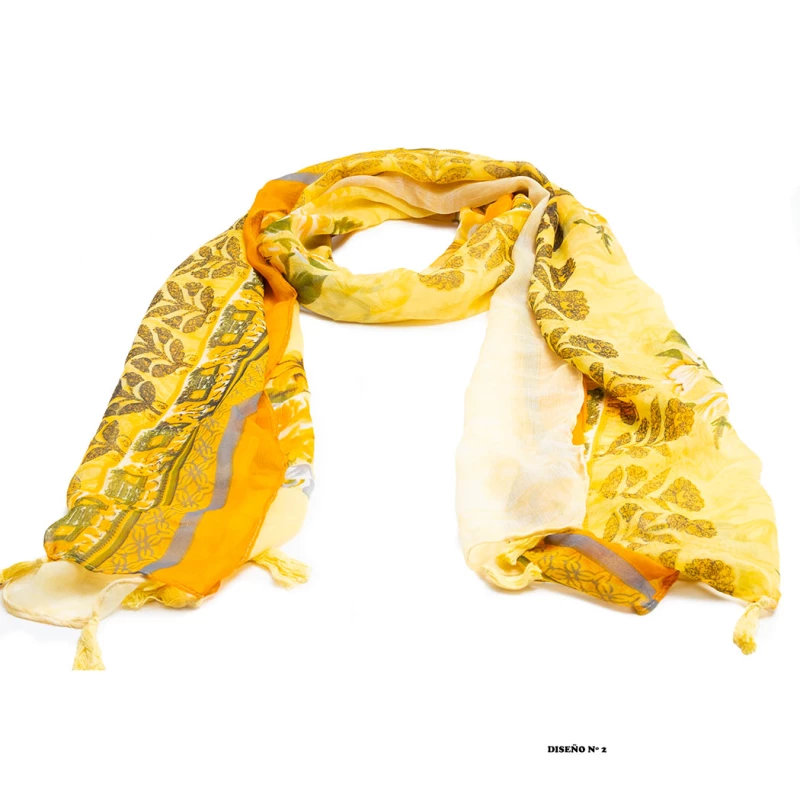 Pañuelo tipo foulard de poliseda estampado con terminacion en borlas.  Tonos amarillos